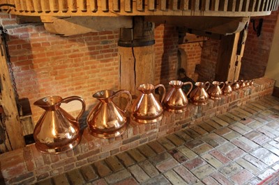 Lot 1314 - Set of eleven Victorian antique graduated copper Imperial flagon measures - 5 gallons- ¼ gill.