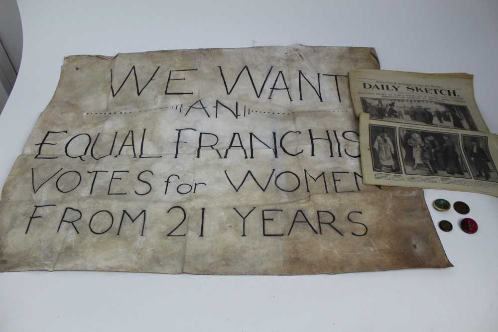 Lot 1058 - Suffragette Banner c1920's plus two tin badges "Women's Social & Political Union", a Suffragette penny and Daily Sketch 1914 Suffragette demonstration on front page.