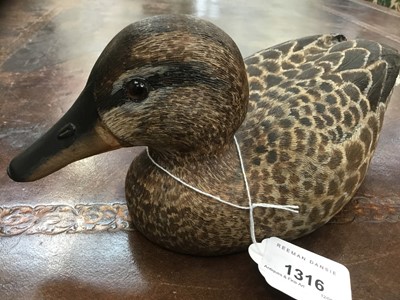 Lot 1316 - Peter Pointer, hand carved sycamore pyrographed decoy duck, 29cm.