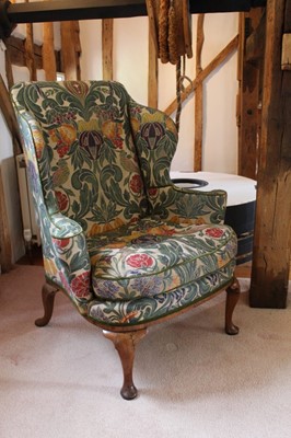 Lot 1327 - George I and later walnut wing back chair, on cabriole legs with pad feet