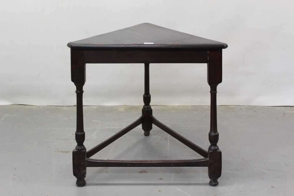 Lot 1365 - Unusual triangular oak table