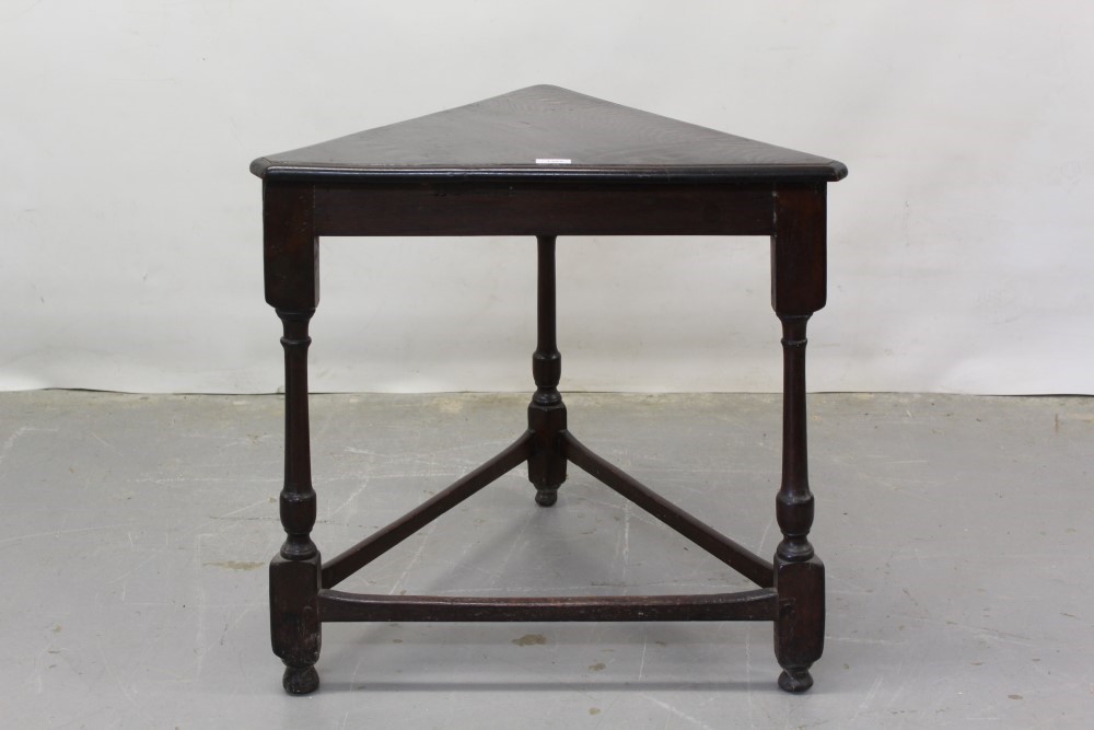 Triangular Fire Table Lot 1365 - Unusual triangular oak table