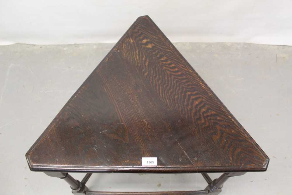 Lot 1365 - Unusual triangular oak table