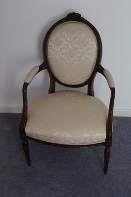 Lot 1336 - 18th century French beech fauteuil with cream upholstered pad back, arms and seat, carved show-wood frame.