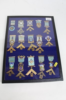 Lot 2015 - A glass case containing 15 assorted Masonic jewels