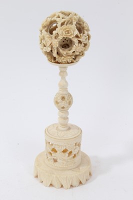 Lot 252 - Late 19th century Chinese puzzle ball on stand