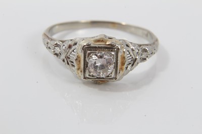 Lot 508 - Art Deco diamond single stone ring with an old cut diamond estimated to weigh approximately 0.25cts in 18ct white gold setting with pierced and chased shoulders. Ring size Q½