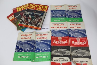 Lot 1059 - Football programmes , 1950s - 60's period including- England Internationals, Arsenal Home programmes, Ipswich and Colchester United later period.  Plus football magazines , goal, Charles Buchan Foo...