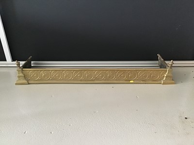 Lot 2 - Antique brass fender with bird and floral...