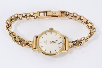 Lot 619 - Ladies Omega wristwatch on gold strap