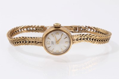 Lot 618 - Ladies Tudor wristwatch in gold case on gold strap