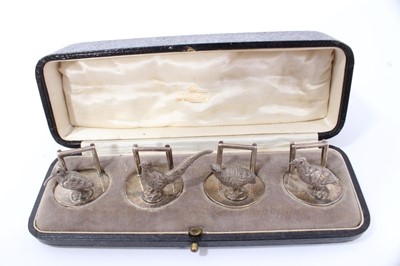 Lot 170 - Set four silver menu holders in the form of game birds