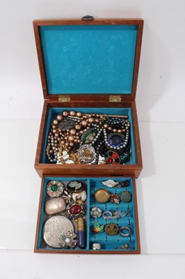 Lot 219 - Wooden jewellery box containing silver compact, vintage brooches, beads and other costume jewellery