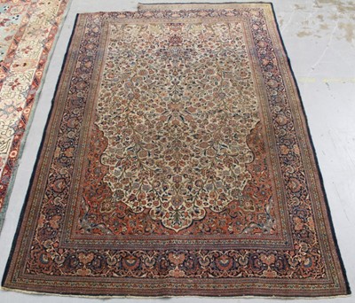 Lot 1417 - Large antique Kashan tree of life rug, cream ground with central vase of flowers issuing foliage, multiple borders