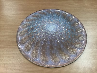 Lot 850 - Rene Lalique, a Roscoff glass charger/bowl, model 10-383, designed circa 1932, blue opalescent with bubbles and fish, engraved R Lalique France to centre, 36cm diameter