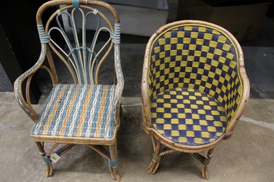 Lot 2167 - Two charming 1920s children's musical chairs with coloured cane weave and bamboo, the seats with French musical movements activated when used.