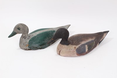 Lot 680 - Two old painted wooden decoy ducks