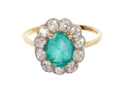 Lot 445 - Emerald and diamond cluster ring