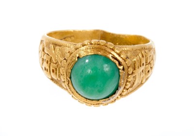 Lot 446 - Chinese 24k gold and jade ring