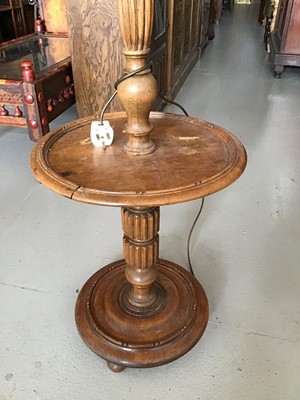 Lot 75 - Oak standard lamp and an Edwardian style ebonised side table with drawer