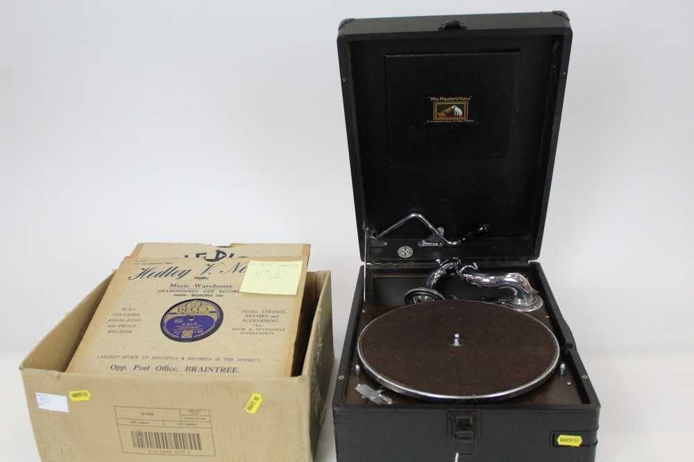 Lot 1923 - HMV 102 portable wind up gramophone with HMV no16 soundbox in working order with needle tin plus a box of 78s including George Formby