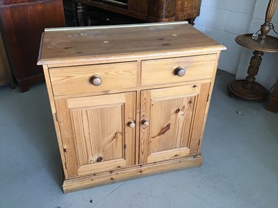 Lot 77 - Pine open bookcase and a pine cupboard with two drawers