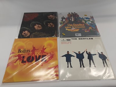 Lot 985 - Seven Beatles LPs in new condition reissues