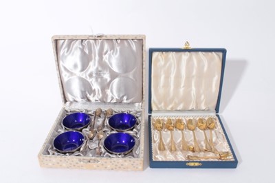 Lot 369 - Set of four Danish silver and cobalt blue enamel salts with spoons in fitted box, together with a set of 830 standard silver gilt coffee spoons in case