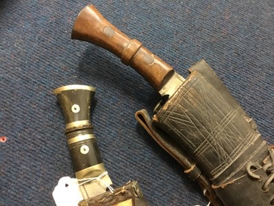 Lot 177 - Two Kukri knives in scabbards