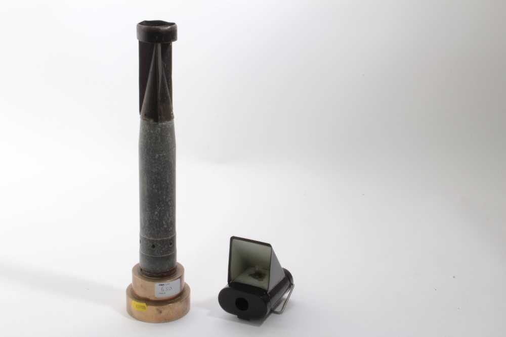 Lot 650 - Second World War Incendiary Bomb tail fin mounted on brass base, approximately 39cm in height