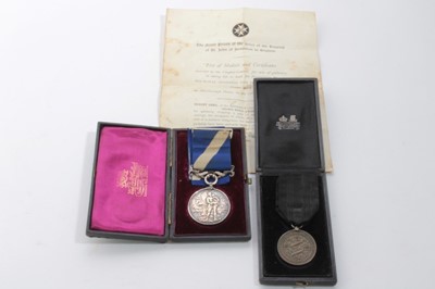 Lot 659 - Scarce Victorian Gallantry awards comprising Quiver medal (silver type) with blue and white ribbon denoting a water rescue, named to William Morgan, dated 8th February 1894 in box of issue together...