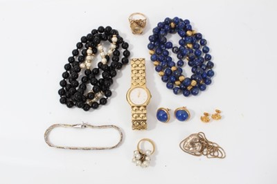 Lot 209 - Two gold cocktail rings, heart locket on chain, bead necklaces and other jewellery