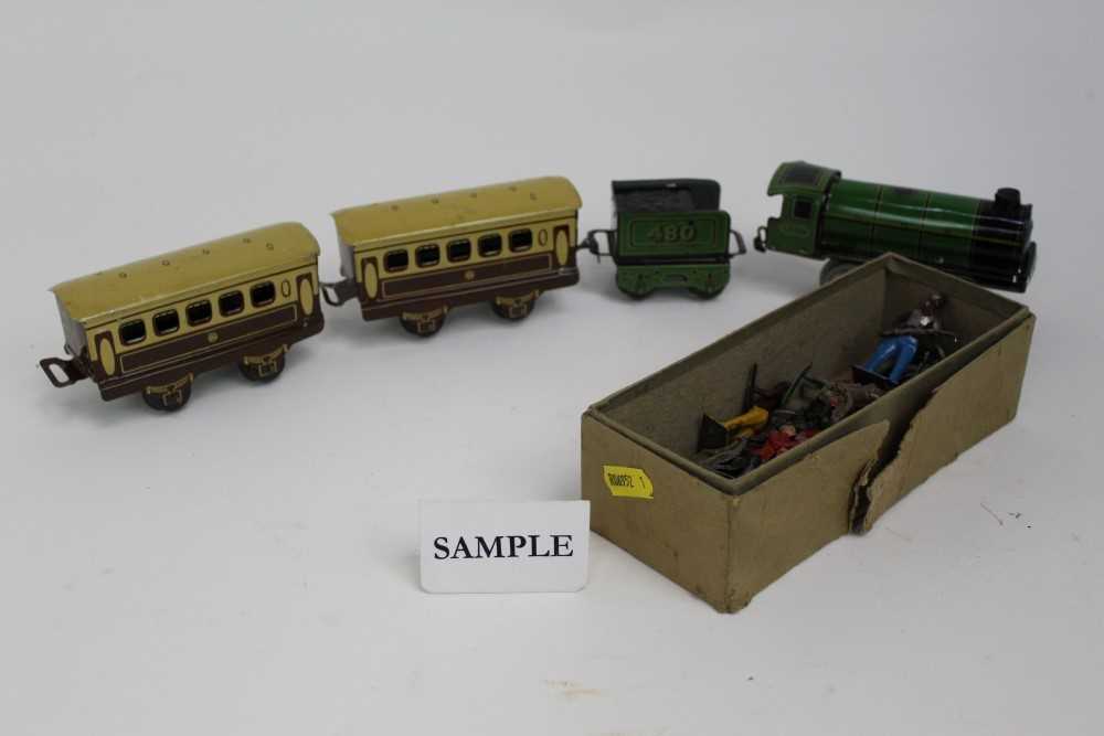 Lot 1469 - Railway Mettoy tin plate train in box together with lead soldiers