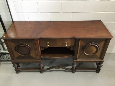 Lot 112 - 1930's mahogany sideboard with central drawers...