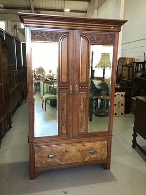 Lot 108 - Late Victorian carved walnut double wardrobe...