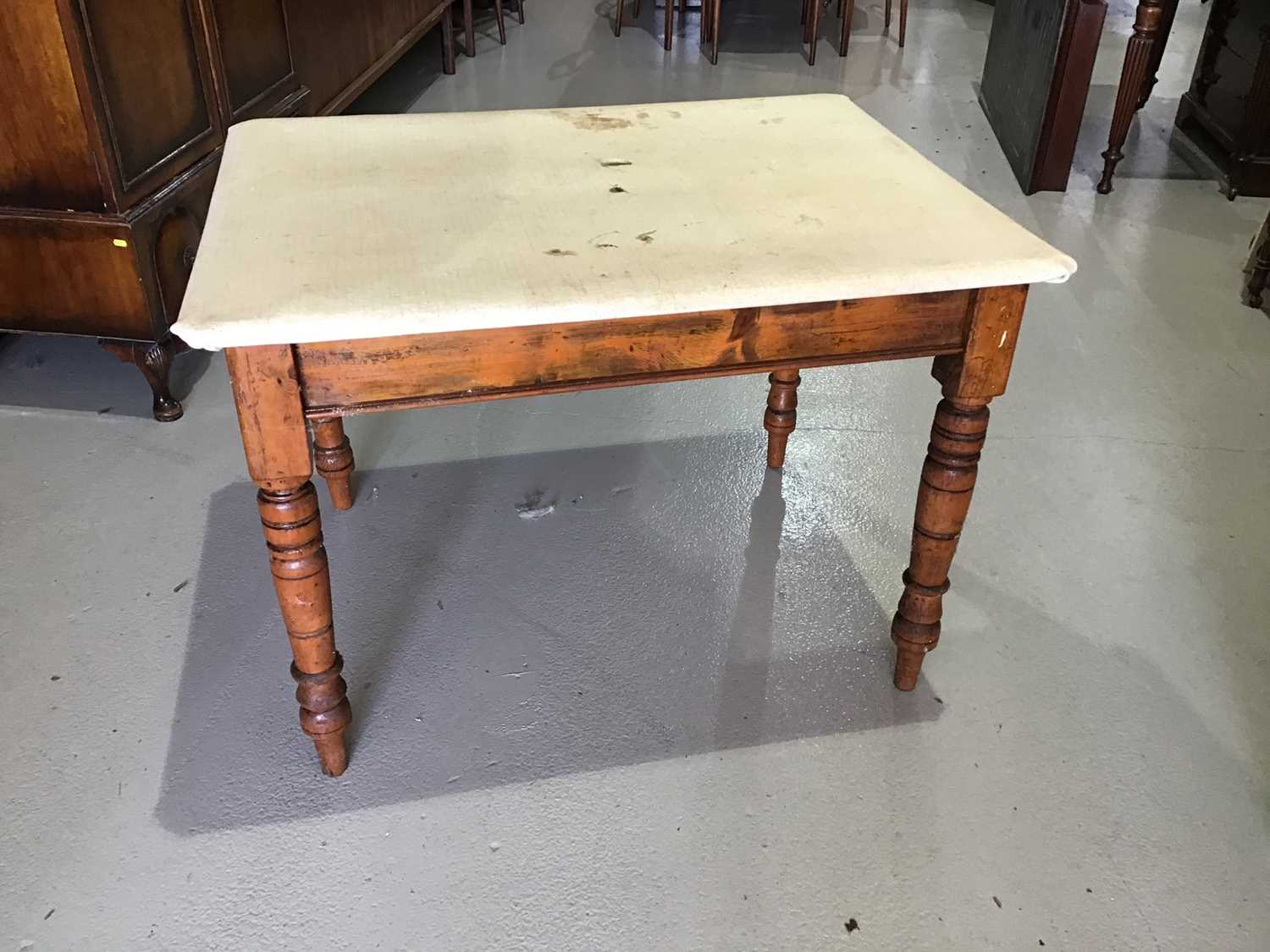 Lot 118 - Victorian pine kitchen table on turned legs...
