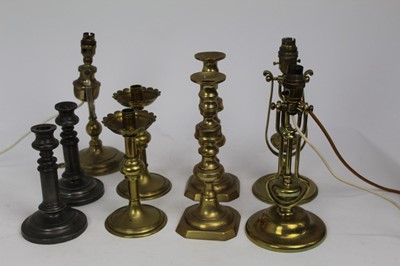 Lot 1963 - Three late 19th Century ship’s gimbal lamps, other candlesticks