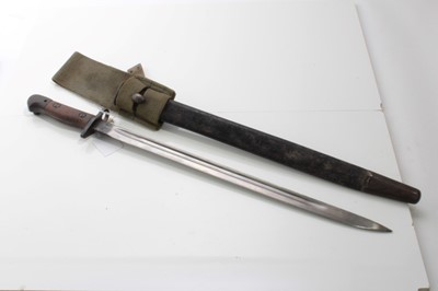 Lot 705 - First World War British 1907 pattern bayonet, stamped - G. R., 1907, 6, 17, Wilkinson, in steel mounted leather scabbard, with canvas webbing frog