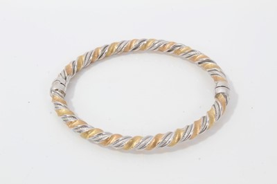 Lot 210 - 18ct white and yellow gold twist bangle