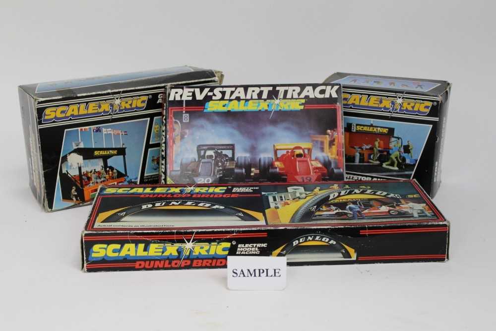 Lot 1470 - Scaletric Super -Stox set in original box plus a selection of boxed accessories.