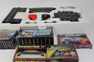 Lot 1470 - Scaletric Super -Stox set in original box plus a selection of boxed accessories.