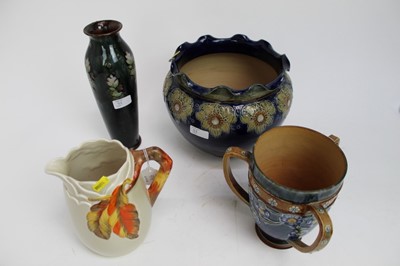 Lot 919 - Doulton stoneware Tyg, together with a Doulton stoneware vase, jardinère and a Clarice Cliff jug (4)