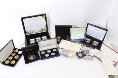 Lot 365 - World - Mixed modern coinage to include Two Pound Silver Britannia cover, commemorating '75th Anniversary of the Battle of Britain', Beatrix Potter 50p coin & stamp collection (boxed) & other Westm...