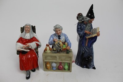 Lot 870 - Three Royal Doulton figures - The Wizard HN2877, The China Repairer HN2943 and The Judge HN2443