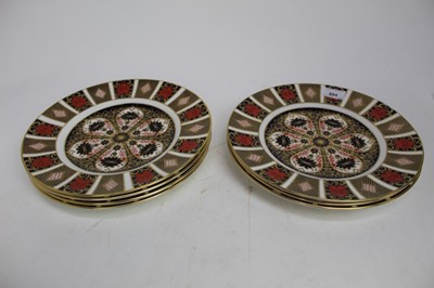 Lot 894 - Seven Royal Crown Derby Imari plates,  pattern number 1128