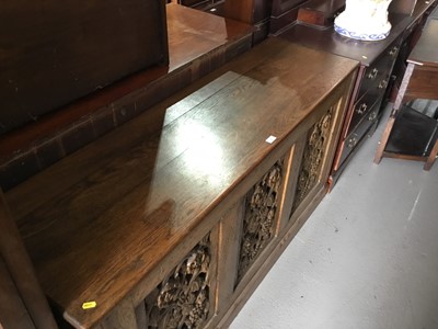 Lot 25 - Oak hall unit with three carved panels on the front decorated with vines, flowers and berries