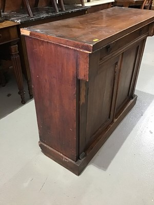 Lot 32 - Victorian mahogany Chiffonier with single drawer below and two panelled doors enclosing one fixed shelf standing on plinth base H84.5cm W102cm D39cm