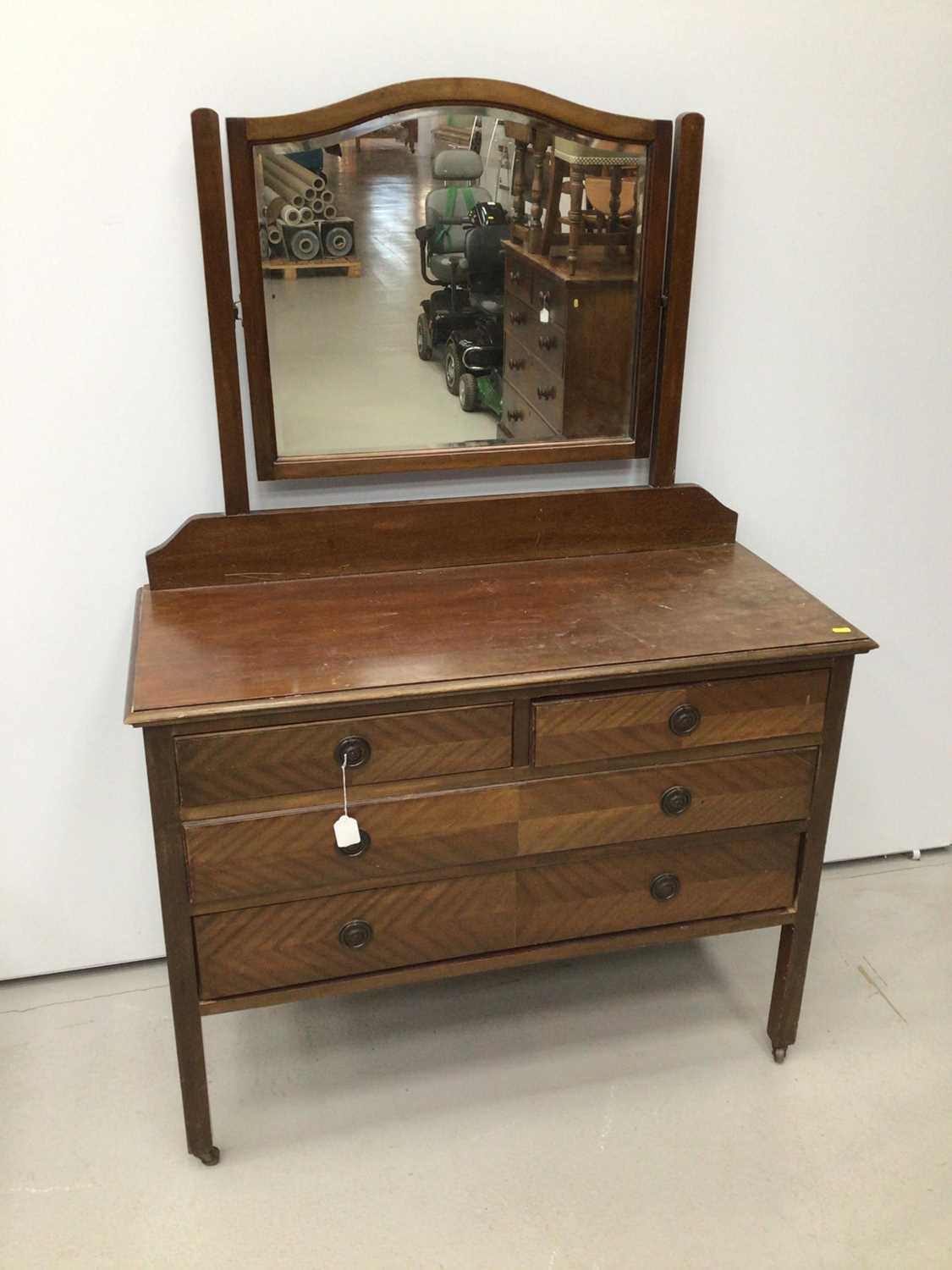 Lot 43 - 1930s mahogany dressing chest with mirrored back and two short and two long drawers below