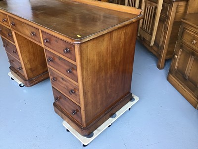 Lot 39 - Victorian mahogany kneehole desk with an arrangement of nine drawers below H70cm W130cm D60.5cm