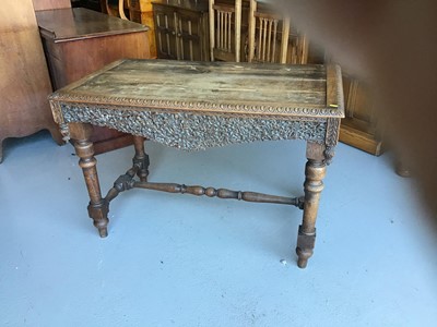 Lot 41 - 19th century carved oak hall table on turned legs joined by stretcher H72cm W107cm D58cm